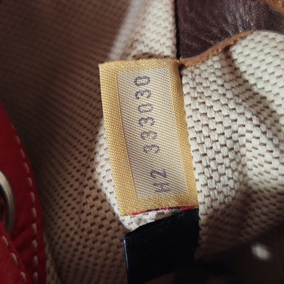 Dooney & Bourke All Weather Red Pebbled Leather Large Bucket Bag